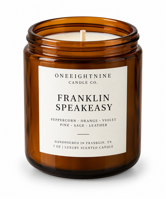 FRANKLIN SPEAKEASY  (7 oz Candle)    Peppercorn • Violet • Pine •  Leather •  Woods